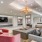 Resident lounge at our apartments for rent in Grapevine, TX, featuring large couches, modern decor, and a flat screen TV.