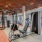 The fitness center at our apartments for rent in Grapevine, featuring free weights, exercise machines, and spin bikes.
