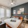 Large well lit bedroom with plush carpets and large windows 
