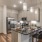 a kitchen with a marble island