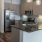 a kitchen with a marble counter top
